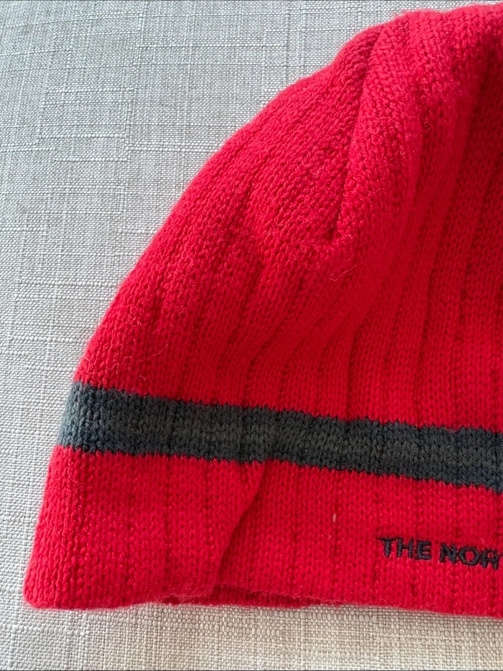 The North Face Red Beanie with Dark Gray Stripe